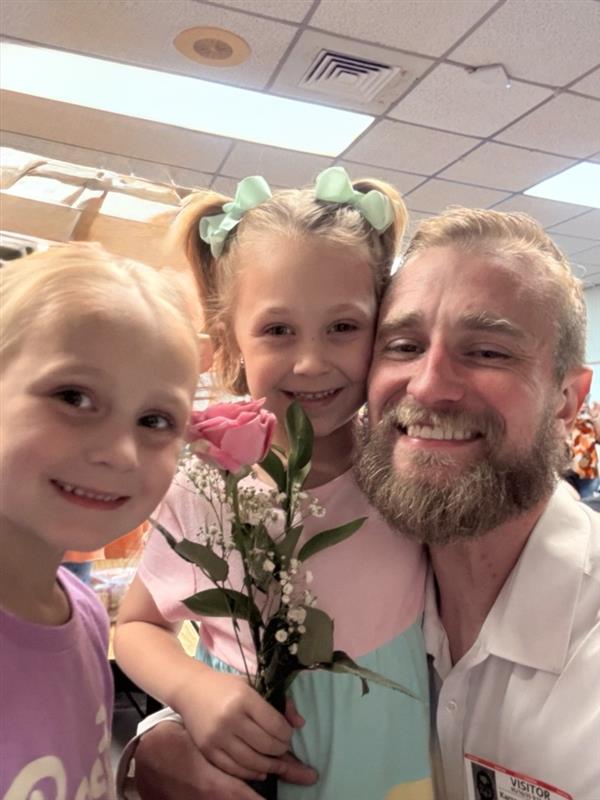 Karson Lawrence with daughters
